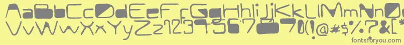 フォントModernCurve – 黄色の背景に灰色の文字