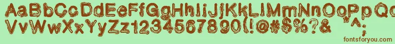 TonerIncident Font – Brown Fonts on Green Background