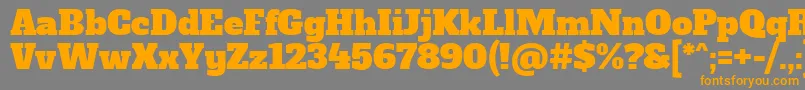 フォントAlfaslaboneRegular – オレンジの文字は灰色の背景にあります。