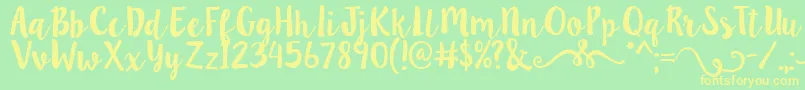 Lillybelle2-Schriftart – Gelbe Schriften auf grünem Hintergrund