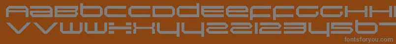 Шрифт InductionRegular – серые шрифты на коричневом фоне