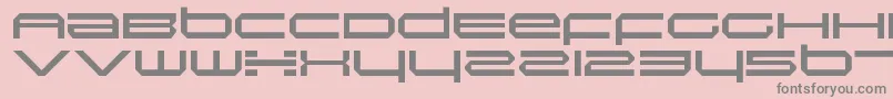 フォントInductionRegular – ピンクの背景に灰色の文字
