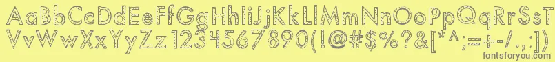 Kbyouvebeenspotted Font – Gray Fonts on Yellow Background