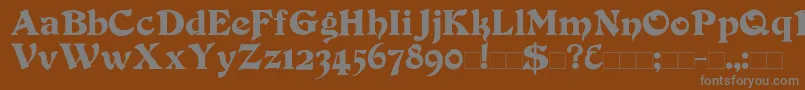 Duvall-fontti – harmaat kirjasimet ruskealla taustalla