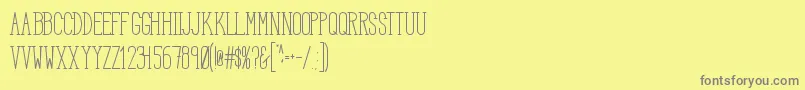 フォントHbmSerenitySerifTitle – 黄色の背景に灰色の文字