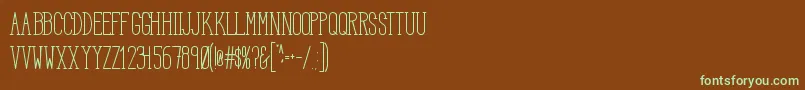 フォントHbmSerenitySerifTitle – 緑色の文字が茶色の背景にあります。