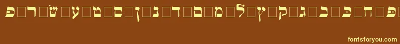 Alefbetn-fontti – keltaiset fontit ruskealla taustalla