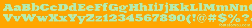 Xna83C-Schriftart – Grüne Schriften auf orangefarbenem Hintergrund