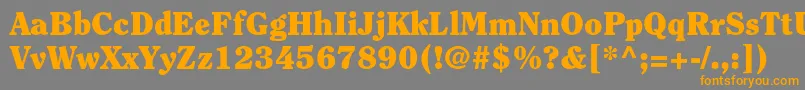 フォントClearfacestdBlack – オレンジの文字は灰色の背景にあります。