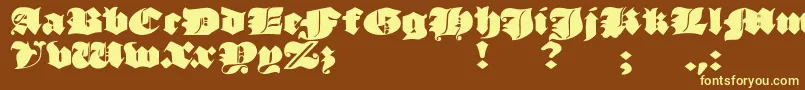 JmhMorenetaDivine Font – Yellow Fonts on Brown Background