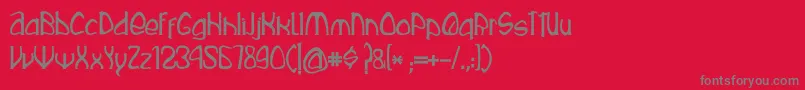 Rustika-Schriftart – Graue Schriften auf rotem Hintergrund