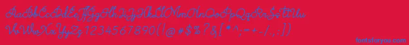 Więcej informacji o czcionce TheodistaDecallyItalic Czcionka TheodistaDecallyItalic – niebieskie czcionki na czerwonym tle