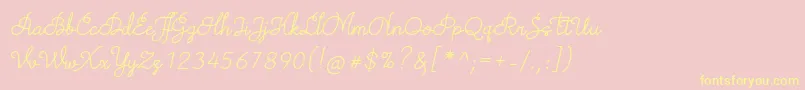 TheodistaDecallyItalic-Schriftart – Gelbe Schriften auf rosa Hintergrund