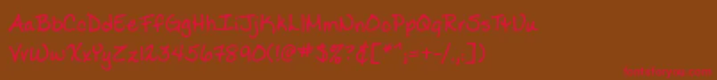 フォントLadylikebb – 赤い文字が茶色の背景にあります。