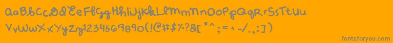 DenneEtude-Schriftart – Graue Schriften auf orangefarbenem Hintergrund