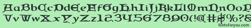 フォントQueencountrye – 緑の背景に黒い文字