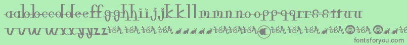 Freeble-fontti – harmaat kirjasimet vihreällä taustalla