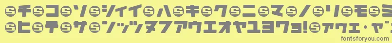 フォントDaidrrj – 黄色の背景に灰色の文字