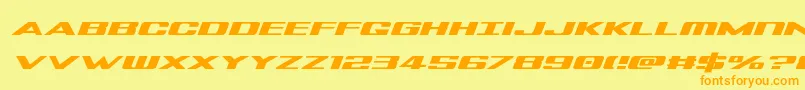 Czcionka Tigersharkexpandital – pomarańczowe czcionki na żółtym tle