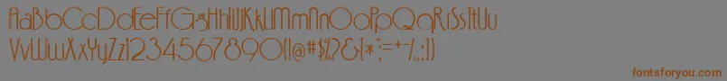 フォントFeenc ffy – 茶色の文字が灰色の背景にあります。