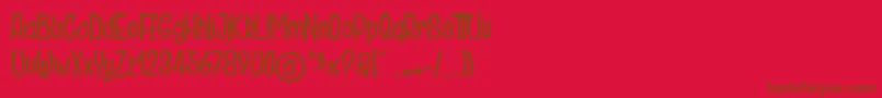 DoctorCosmicucumber-Schriftart – Braune Schriften auf rotem Hintergrund