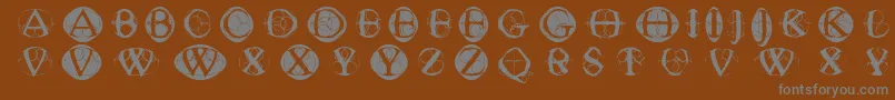 Typoghosts Font – Gray Fonts on Brown Background