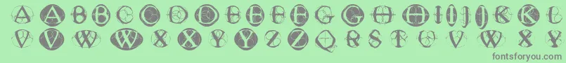 Typoghosts Font – Gray Fonts on Green Background
