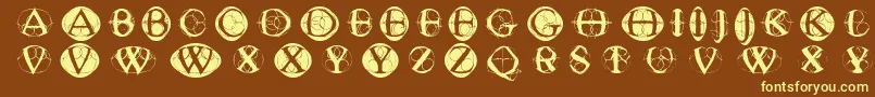 フォントTypoghosts – 黄色のフォント、茶色の背景