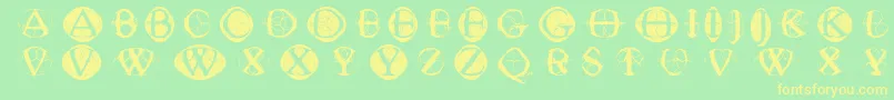 フォントTypoghosts – 黄色の文字が緑の背景にあります