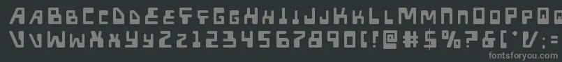 Xpedtitle-fontti – harmaat kirjasimet mustalla taustalla