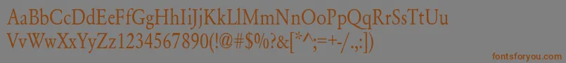 フォントYearlindNormalThin – 茶色の文字が灰色の背景にあります。