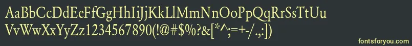 フォントYearlindNormalThin – 黒い背景に黄色の文字