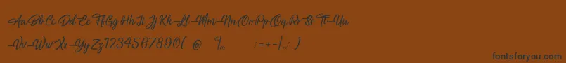 MagnificentSupernatural Font – Black Fonts on Brown Background