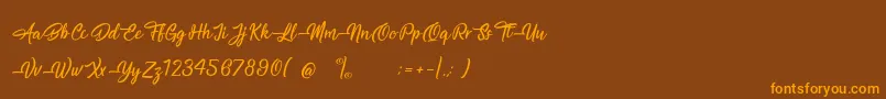 MagnificentSupernatural Font – Orange Fonts on Brown Background