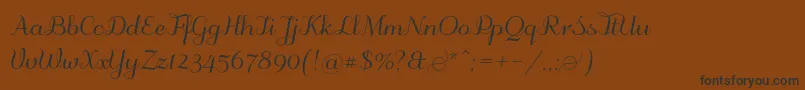 フォントOdstemplik – 黒い文字が茶色の背景にあります