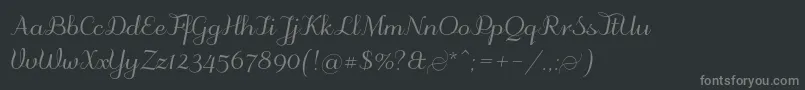 フォントOdstemplik – 黒い背景に灰色の文字