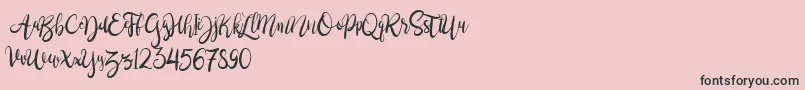 BrushgyoPersonalUse-Schriftart – Schwarze Schriften auf rosa Hintergrund