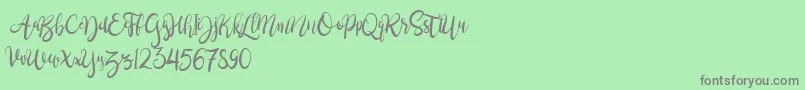 BrushgyoPersonalUse Font – Gray Fonts on Green Background