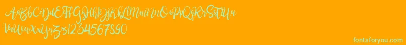 BrushgyoPersonalUse-Schriftart – Grüne Schriften auf orangefarbenem Hintergrund