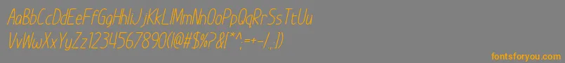 フォントImWunderlandItalic – オレンジの文字は灰色の背景にあります。