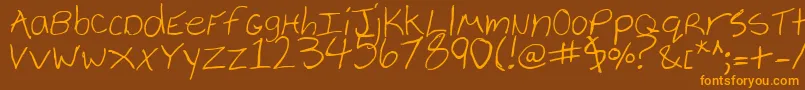 Vielkalahizo Font – Orange Fonts on Brown Background