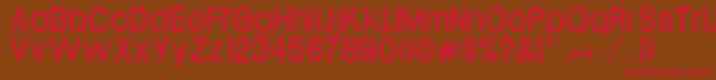 UptightTh-Schriftart – Rote Schriften auf braunem Hintergrund