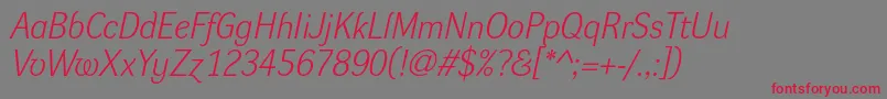DynagrotesklItalic-Schriftart – Rote Schriften auf grauem Hintergrund