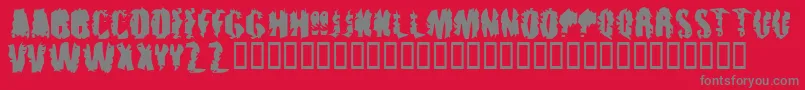 Fonte Punkassbleed – fontes cinzas em um fundo vermelho