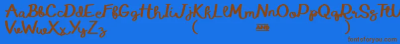 Шрифт EduardoAureliaDemo – коричневые шрифты на синем фоне