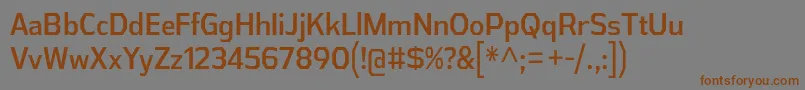 フォントAthabascaCdRg – 茶色の文字が灰色の背景にあります。