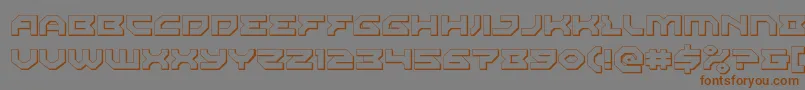 フォントXenodemon3D – 茶色の文字が灰色の背景にあります。