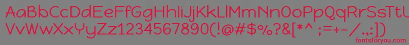 Czcionka HappymonkeyRegular – czerwone czcionki na szarym tle