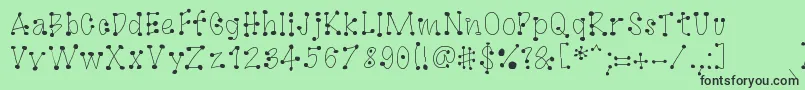 GagooByKreativfont.Com Font – Black Fonts on Green Background