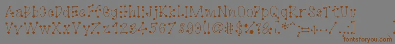 GagooByKreativfont.Com Font – Brown Fonts on Gray Background